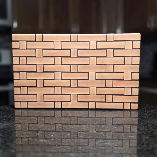 Wooden Cutting board with a woven pattern to look like it's made from wicker.