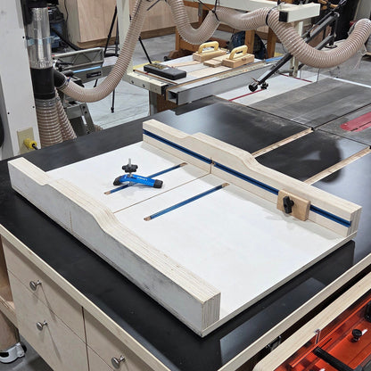 Crosscut sled sitting on the outfeed table